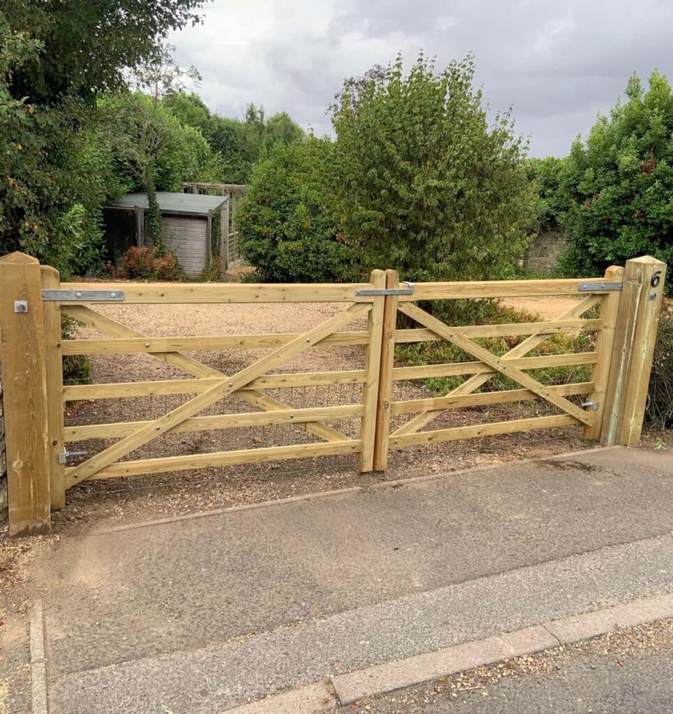 This is a photo of a wooden driveway gate installed by Fast Fix Fencing Mundford